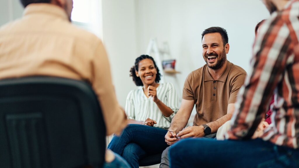 Group therapy at an alcohol rehab in Denver.