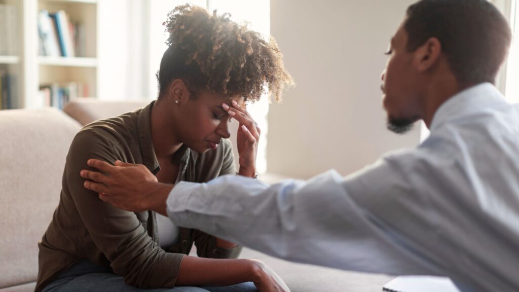 A woman struggling with alcohol use disorder.