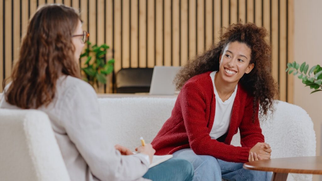 A woman discusses healthy coping techniques during heroin addiction treatment in Denver, Colorado