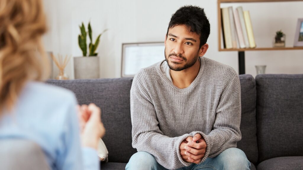 A man struggling with addiction seeks heroin addiction treatment in Denver, Colorado