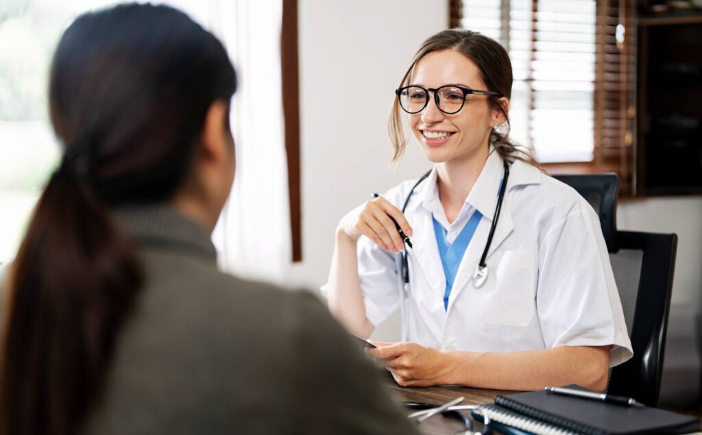 Doctor guiding a client through prescription drug addiction treatment in Denver, Colorado.