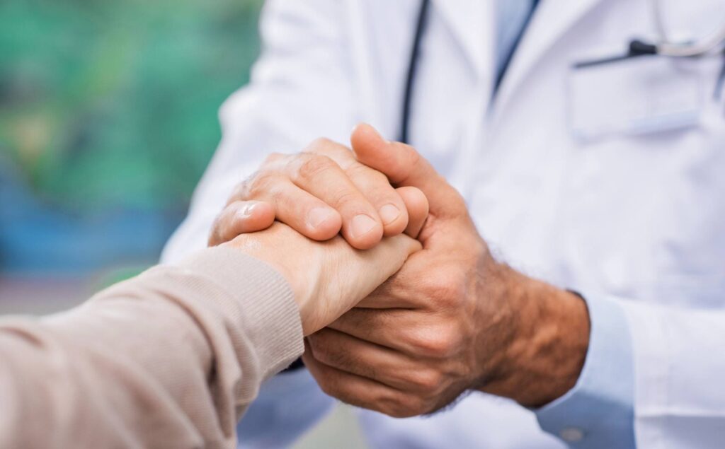 Doctor supporting a client during prescription drug addiction treatment in Denver, Colorado.